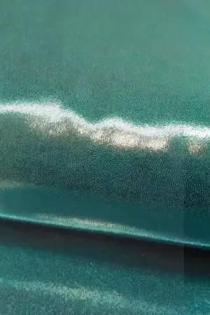 Voordeelprijs Lycra stof, 4 way stretch,dusty groen /zilver. X3028