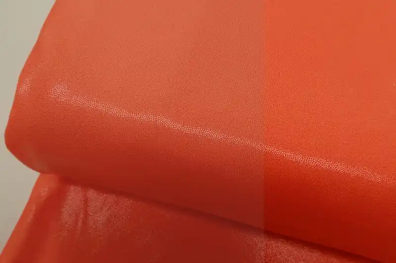 Actieprijs Lycra stof, 4 way stretch, glanzend, neon oranje. R960